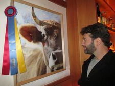 Blind screenwriter John Buffalo Mailer greets Narcissa the cow